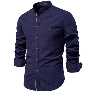 Close-up of contrast trim along the upper placket of a men's shirt