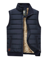 Detail shot of the full-length front zip and zip pull on the gilet