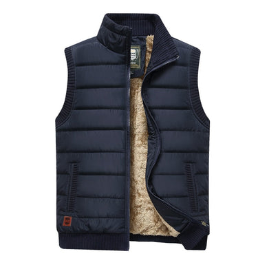 Detail shot of the full-length front zip and zip pull on the gilet