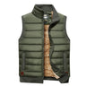Side view showing sleeveless cut and ribbed hem of the men's padded gilet