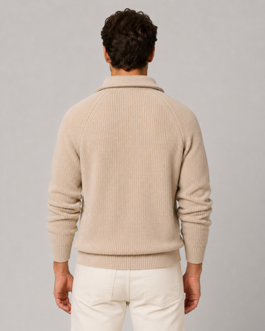 Model wearing the quarter zip jumper styled with dark trousers and boots