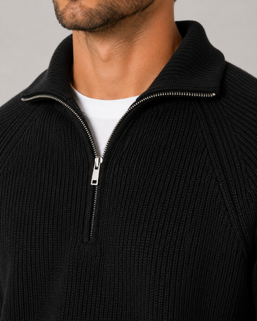Side view of the regular-fit jumper showing ribbed hem and cuffs