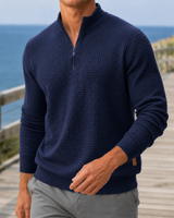 Men's waffle knit jumper styled with chinos, three-quarter view