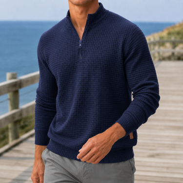Men's waffle knit jumper styled with chinos, three-quarter view