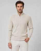 Close-up of ribbed hem at base of men's knit cardigan