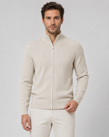 Close-up of ribbed hem at base of men's knit cardigan