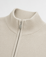 Men's zip up cardigan worn over a plain crew neck T-shirt