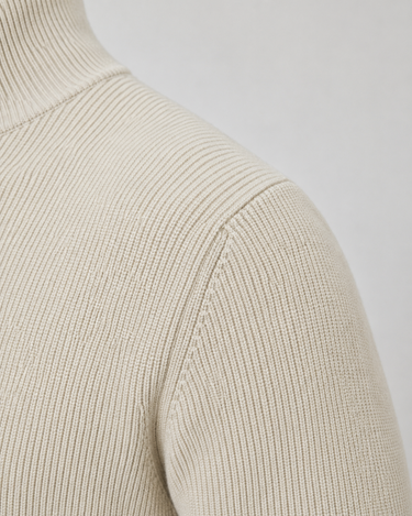 Three-quarter view of men's cardigan showing zip and collar detail