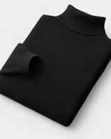 Men's roll neck jumper worn under a structured blazer