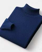 Close-up of ribbed hem and fine knit on men's roll neck jumper