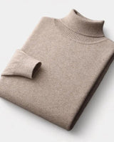 Men's roll neck jumper styled with tailored trousers