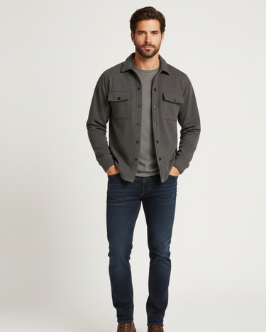 Close-up of chest pocket with button flap on men's flannel overshirt