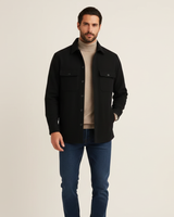Men's flannel overshirt with button front and spread collar, worn casually