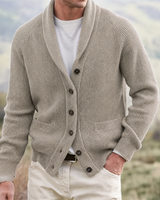 Back view of men's shawl collar cardigan showing ribbed hem