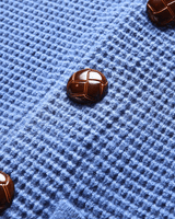 Ribbed hem detail on men's shawl collar cardigan