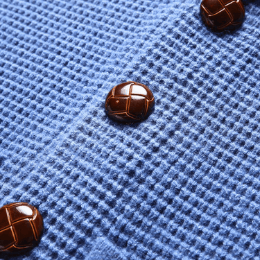 Ribbed hem detail on men's shawl collar cardigan