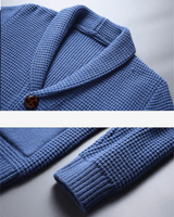Men's cashmere cardigan styled with tailored trousers