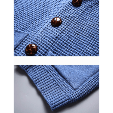 Detail shot of ribbed trim on pocket and hem of cashmere cardigan