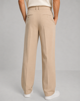Close-up of structured waistband with button closure on men's tailored trousers