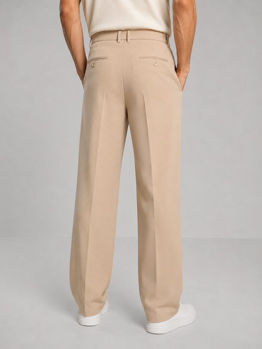 Close-up of structured waistband with button closure on men's tailored trousers