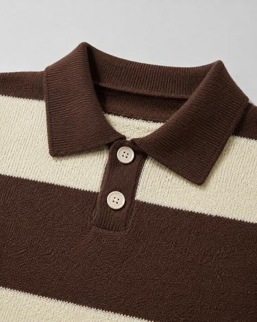 Side view of dropped-shoulder knitted polo sweater with ribbed hem
