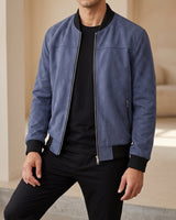 Men's suede bomber jacket with zip front and ribbed collar, worn from the front