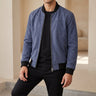Men's suede bomber jacket with zip front and ribbed collar, worn from the front