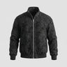 Full-length view of the men's faux leather bomber jacket styled with casual trousers