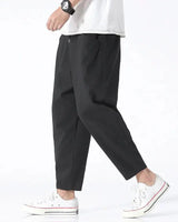 Side view showing the tapered leg and above-ankle cropped length