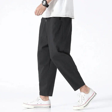 Side view showing the tapered leg and above-ankle cropped length