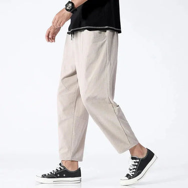 Detail shot of the adjustable drawstring waistband and articulated panelling
