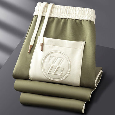 Overhead flat-lay of the jacket and joggers laid out together