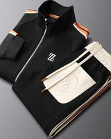 Close-up of sleeve stripe detailing on the tracksuit jacket
