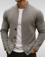Side view of the cardigan showing the hip patch pocket and clean silhouette
