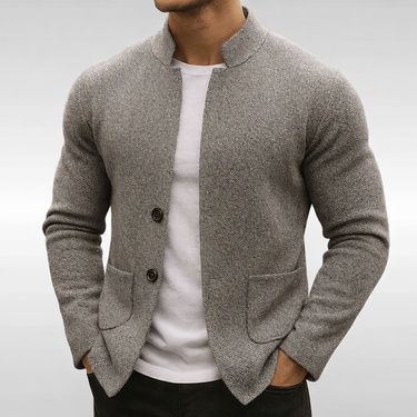 Side view of the cardigan showing the hip patch pocket and clean silhouette