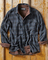Front view of a men's western stripe shirt with pointed collar and chest pocket