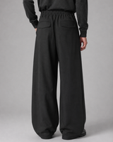 Close-up of tailored waistband with belt loops and button-zip fastening