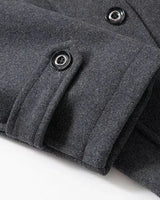 Shoulder epaulette detail on the wool overcoat