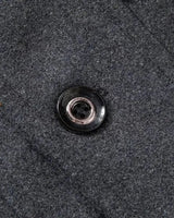 Zip chest pocket and button-flap hip pocket detail