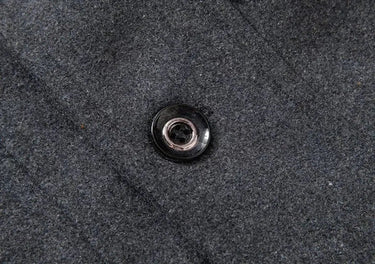 Zip chest pocket and button-flap hip pocket detail