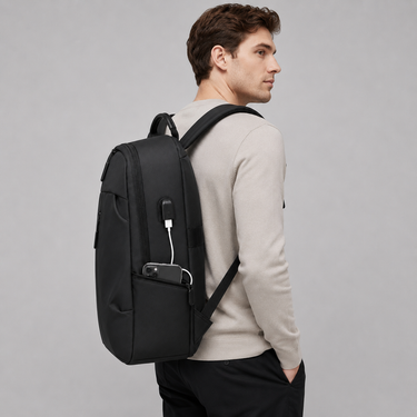 Back view showing padded shoulder straps and back panel of the backpack