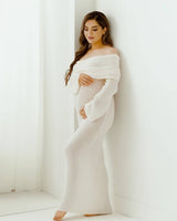 Close-up of the off-shoulder neckline and long sleeve detail in white