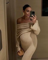 Back view of the long-sleeve off-shoulder maternity dress in apricot