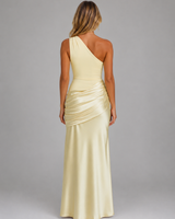 Side view showing the ruched waist and hip detailing of the maxi dress