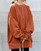 Detail shot of drop shoulder and sleeve cuff on oversized crewneck jumper