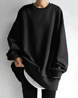 Oversized crewneck jumper with drop shoulders and tunic-length hem, front view