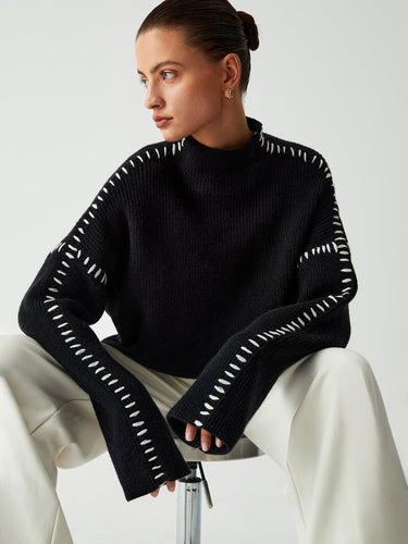 Close-up of contrast stitching along the sleeve seam
