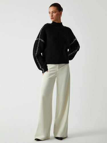 Back view of the relaxed oversized jumper with contrast-stitch shoulder detail