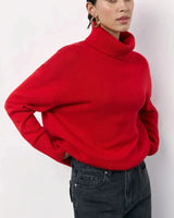 Back view of the red knitted oversized sweater