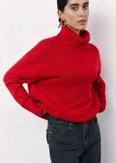 Back view of the red knitted oversized sweater